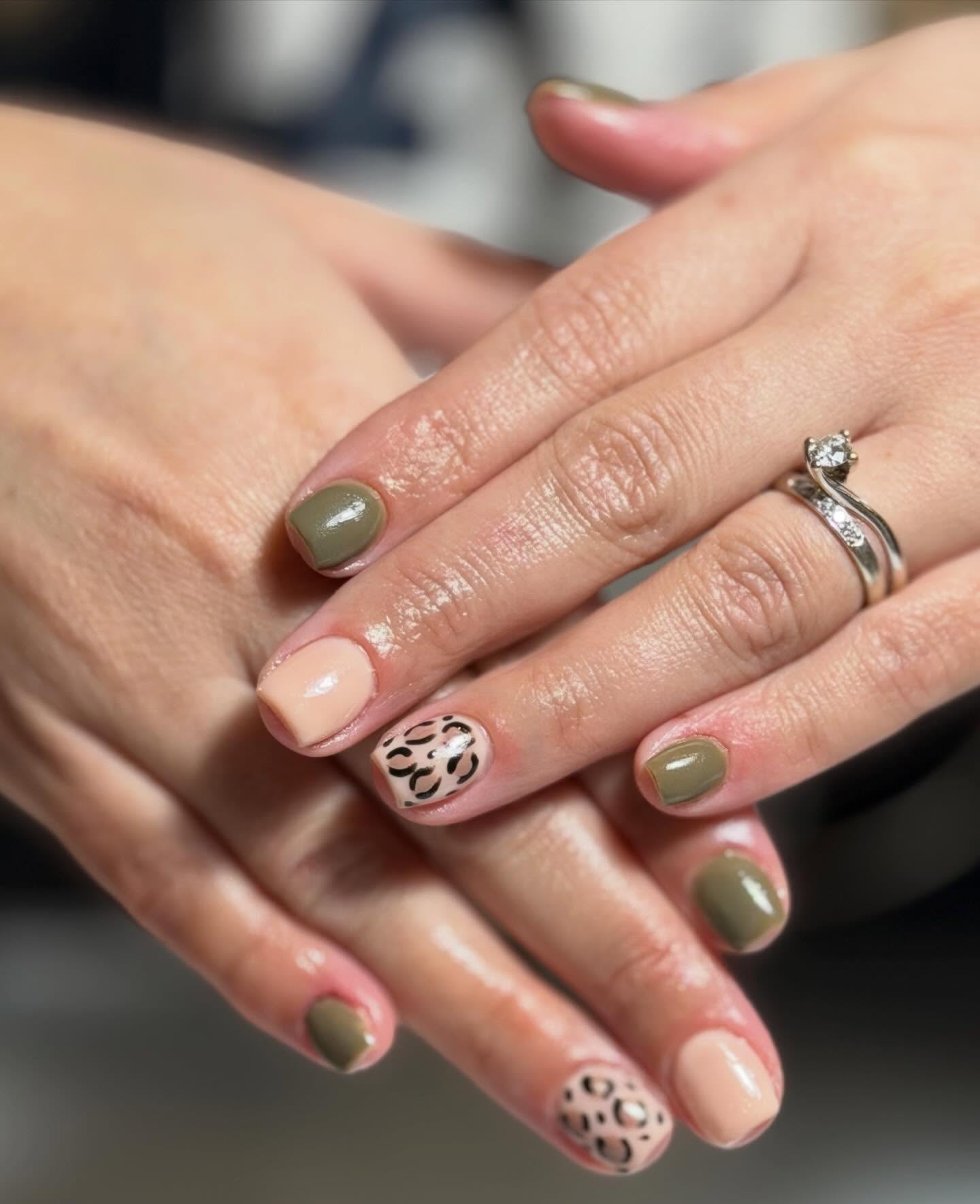 Olive green and nude nails with leopard accent