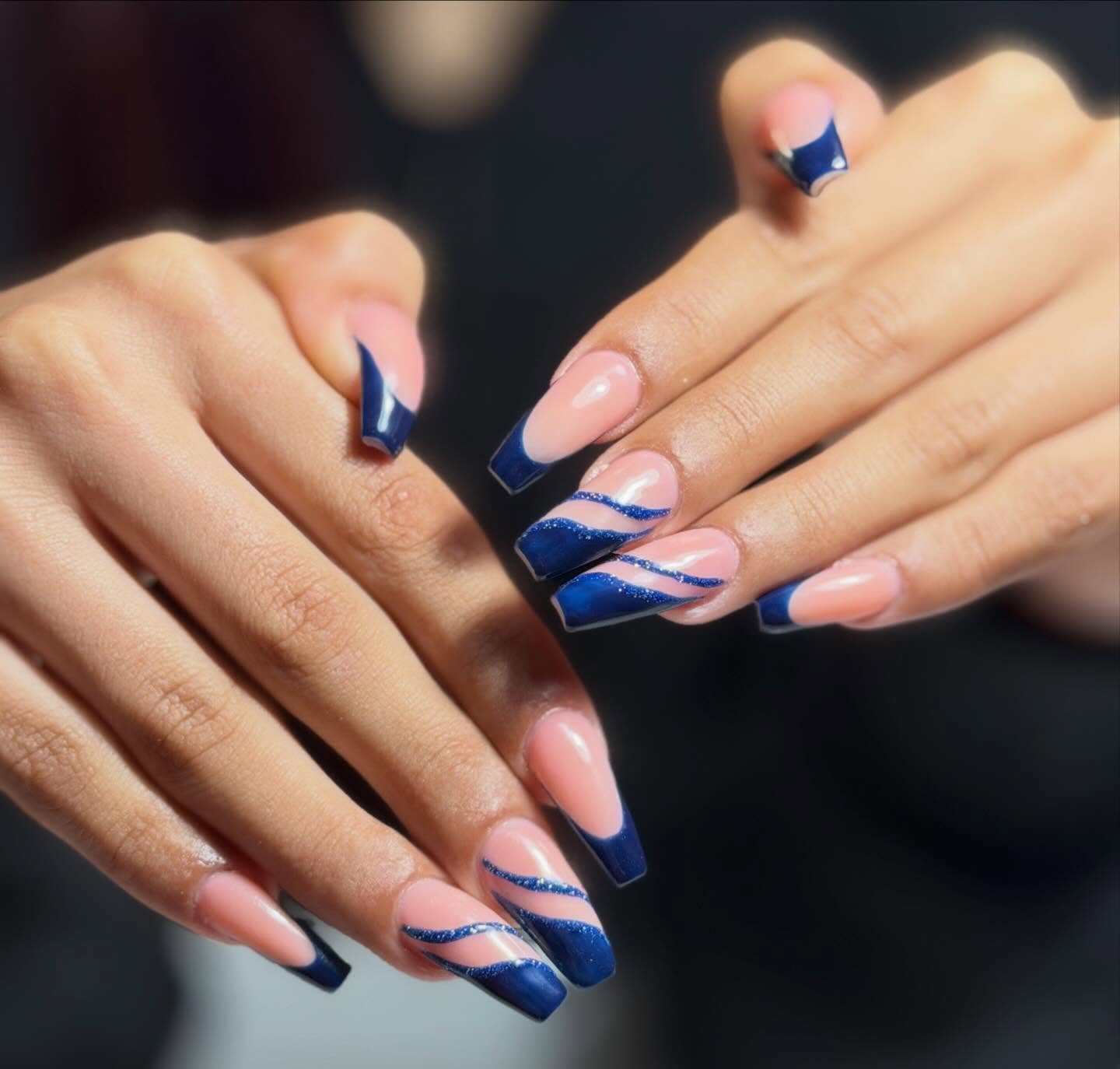 Deep blue French tips with swirl art